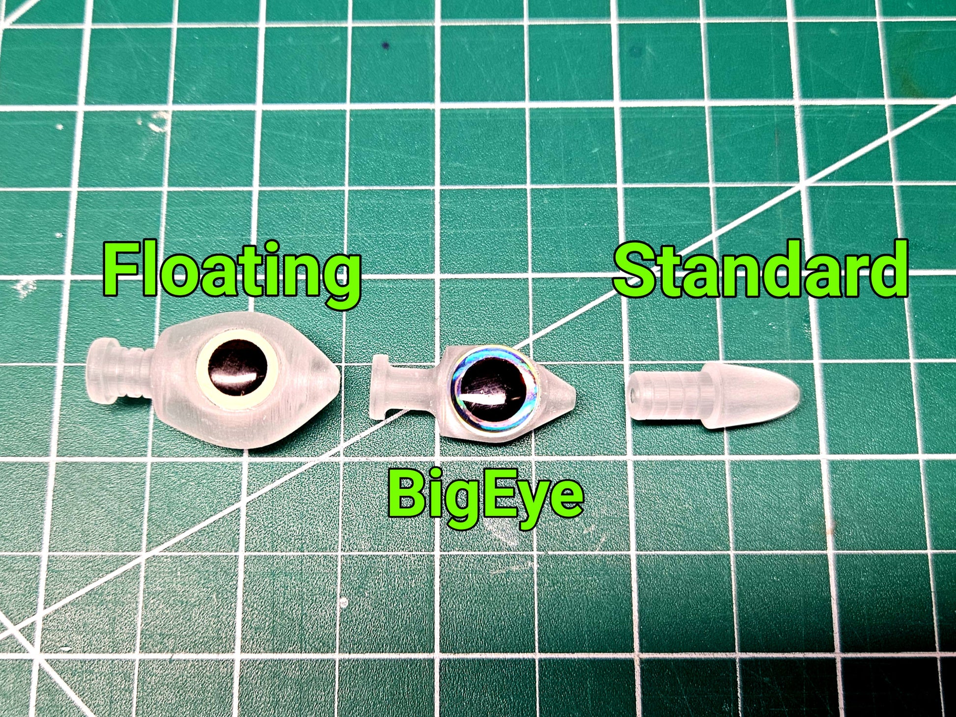 BigEye vs Floating vs Standard Trolling Fly Bullet Heads on Green work mat