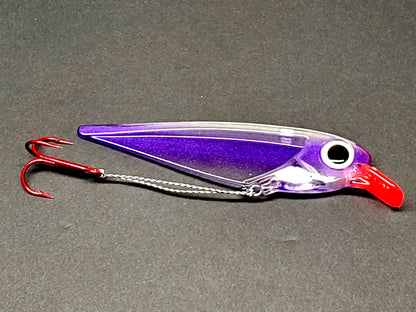 Purple FlatFin Minnow Lure on dark gray background