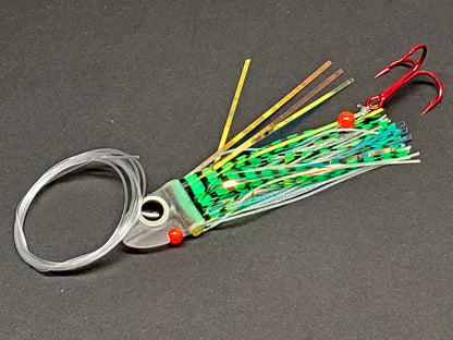 Salmon trolling fly with  green tiger striped black and red details on a gray background