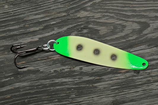 Fisher Tackle UltraMega Glow Green Scooter salmon trolling spoon with green glow base, green tips and 3 black spots in daylight