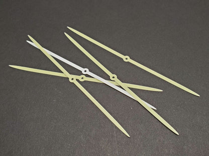 5 salmon trolling fly glow strips in daylight on dark gray background