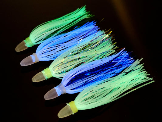 5 twinkie flies glowing blue and green