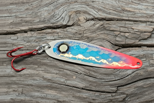 Bloody Zombie hot red tipped glow spoon with glow eye on weathered wood background