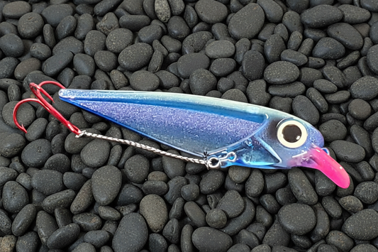 Blue lure on gray pebbles background