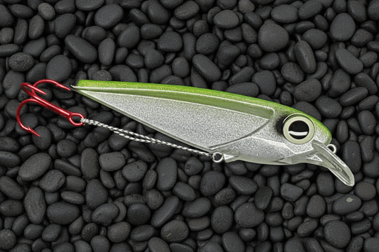 Salmon trolling lure FlatFin Minnow 'Real Deal Green' in daylight showing realistic pearl to silver to greenish back like an actual alewife when seen in shallows of lake michigan