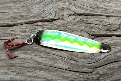 Chrissy-Chrissy spoon on weathered wood background