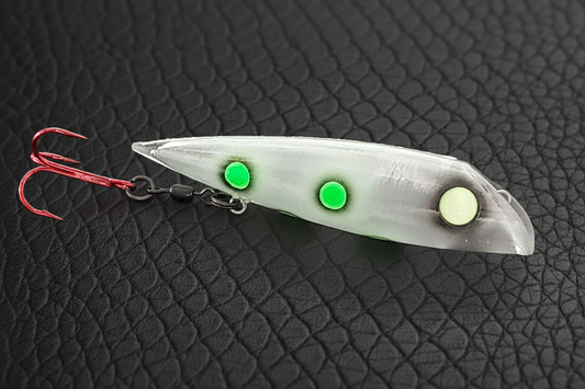 LIVING DEAD FROG FishGunn salmon trolling plug by Fisher Tackle in daylight showing the translucent body and frog-like green dots fringed in black