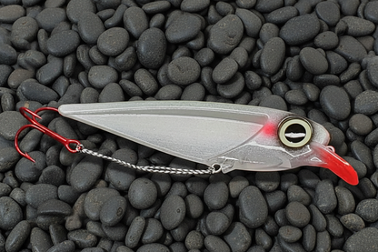 Clear lure on gray pebbles background