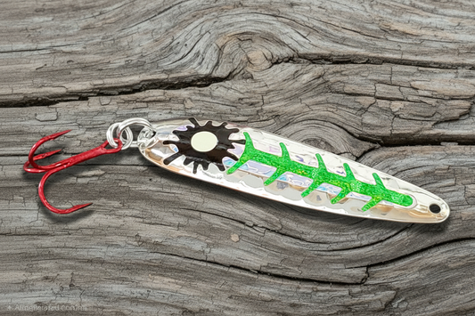 Green Sparkle Sploosh spoon on weathered wood background