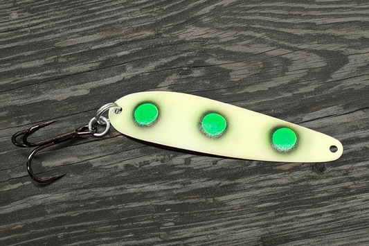Fisher Tackle UltraMega Glow Green Eyes salmon trolling spoon with green glow base, green spots fringed in black in daylight