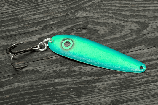 Fisher Tackle UltraMega Glow 'BlueGreen Gunnship' salmon trolling spoon with Green glow base, a large black eye and blue sides in daylight