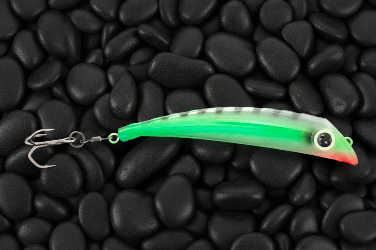 BubbleDart Long Green Racer on black pebbles