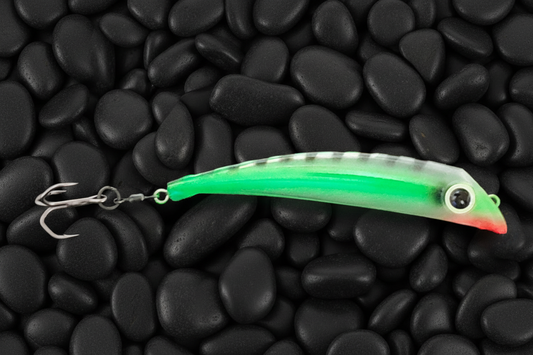 BubbleDart Long Green Racer on black pebbles