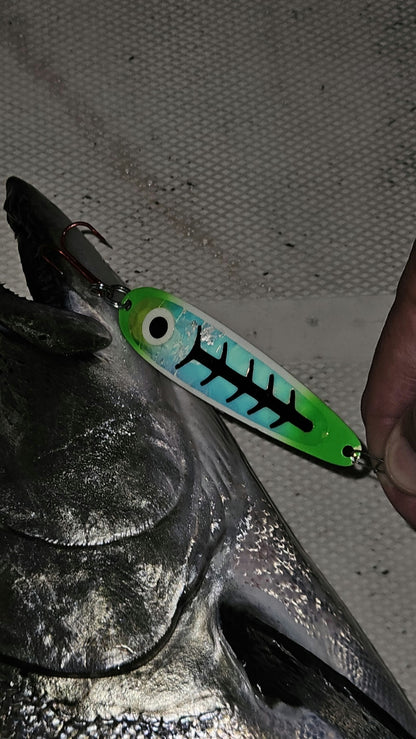 Glow 'Kevins Carbon' Trolling Spoon hanging from big salmons mouth in boat held laying on boat deck