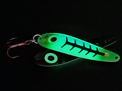 Glowing 'Kevins Carbon' Trolling Spoon on black background