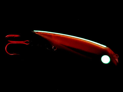 FishGunn Salmon trolling plug 'Mr. Pool' with spine glowing in the dark transmitting an eerie red glow and large all glow 'zombie' eye