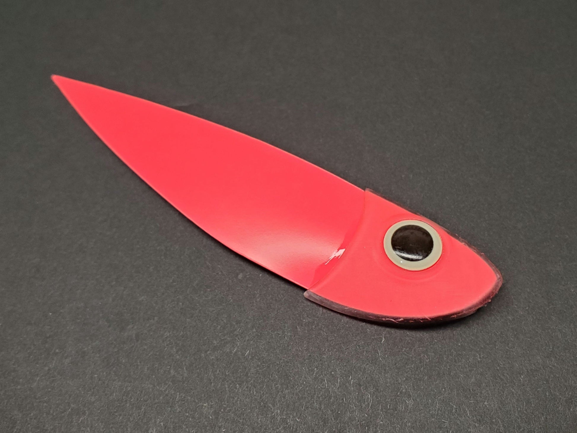 RedGlow Gunnee StripFly against dark gray background