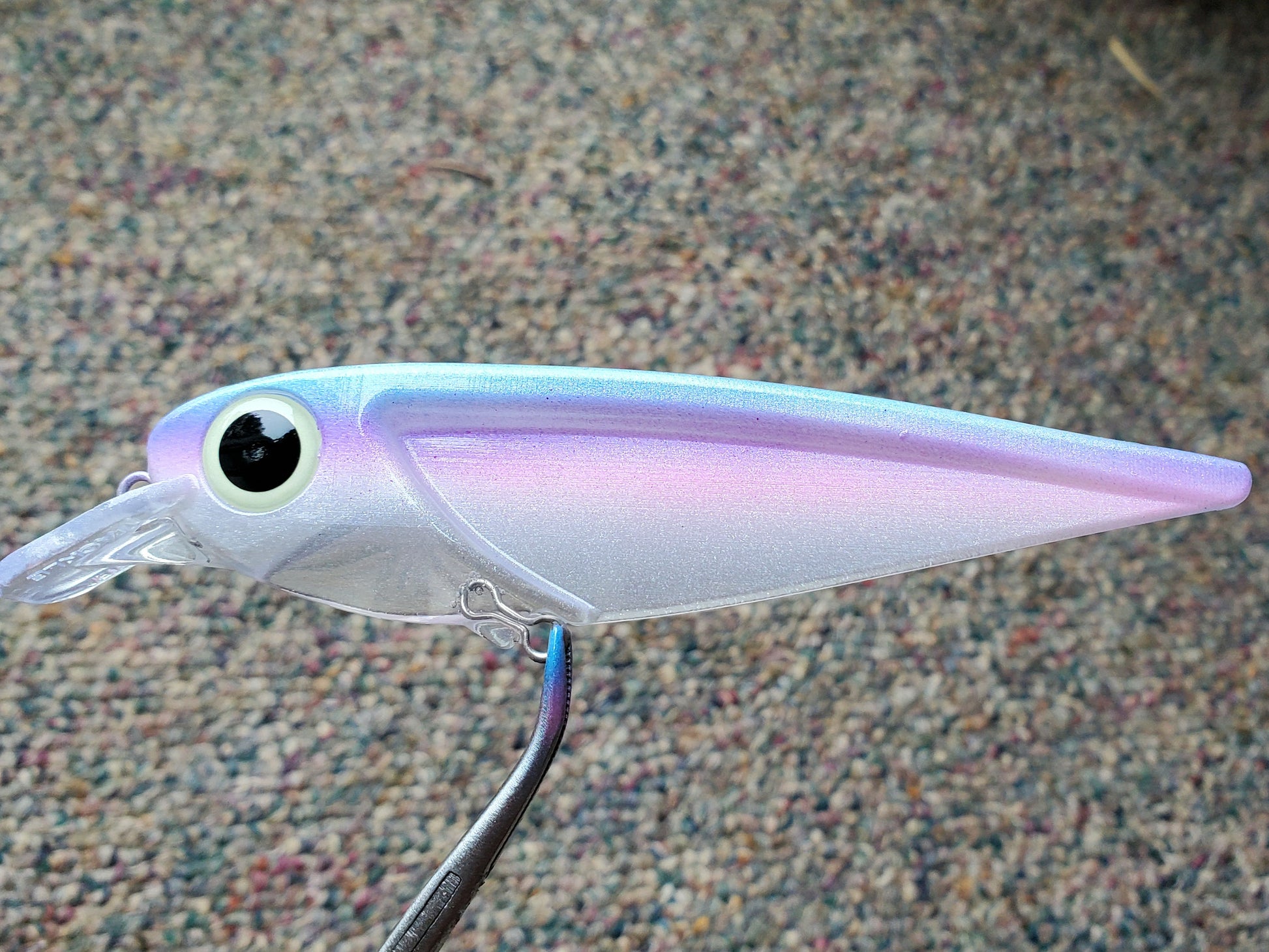 FlatFin Minnow 'Venus' - Fisher Tackle Company daylight shot showing shimmering pearlescent finish with pink/blue/pruple stripes