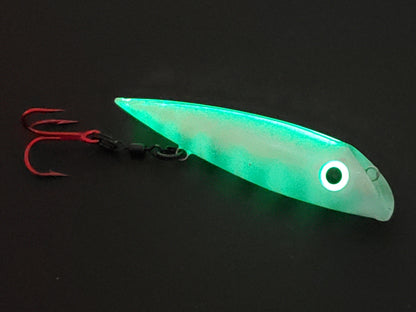 Made for salmon trolling the FishGunn Salmon Plug 'WhiteWasp' glowing from whole body with just spine and eye charged with UV