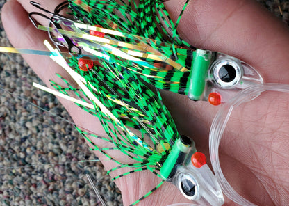 Tiger Green FlatHead Trolling Flies - 2pcs - in palm of hand Fisher Tackle Company