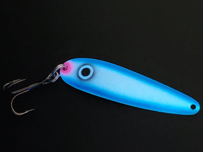 Fisher Tackle UltraMega Glow 'Blue Gunnship' salmon trolling spoon with Blue glow base, a large black eye and blue sides glowing in dark