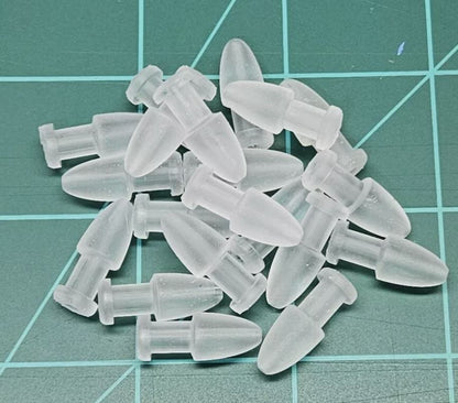 Loose pile of 20 Regular-size Collared Salmon Trolling Fly Heads, highlighting the semi-translucent UV material and the keeper collar