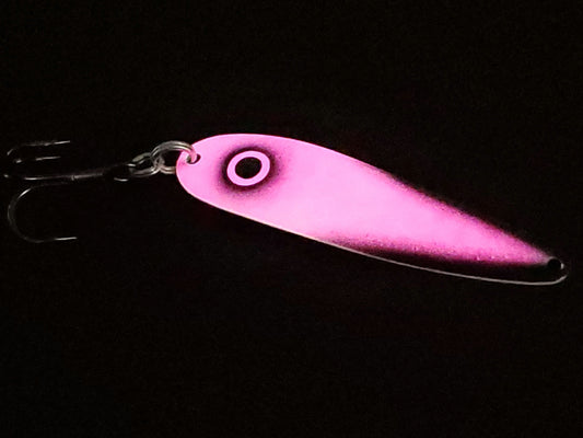 Fisher Tackle UltraMega Glow 'Screaming Puck Bunny' salmon trolling spoon with Hot Pink glow base, black tips and eye glowing in dark