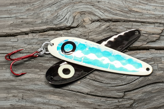 Spoon on weathered wood background